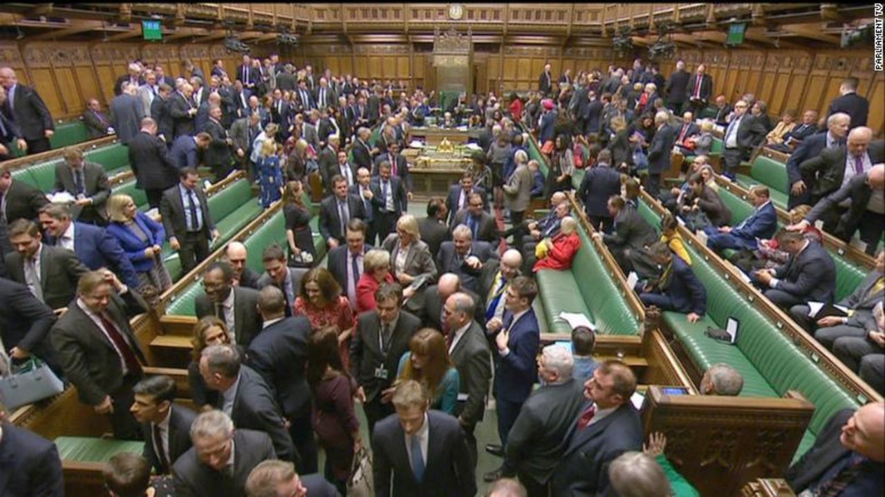 Lawmakers vote in the House of Commons.