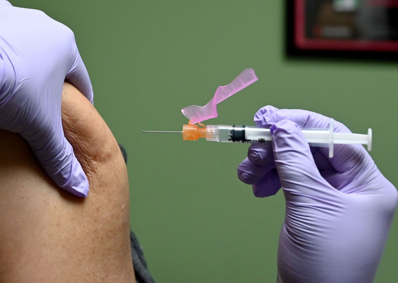 A man gets a flu shot at a health facility in Washington January 31.