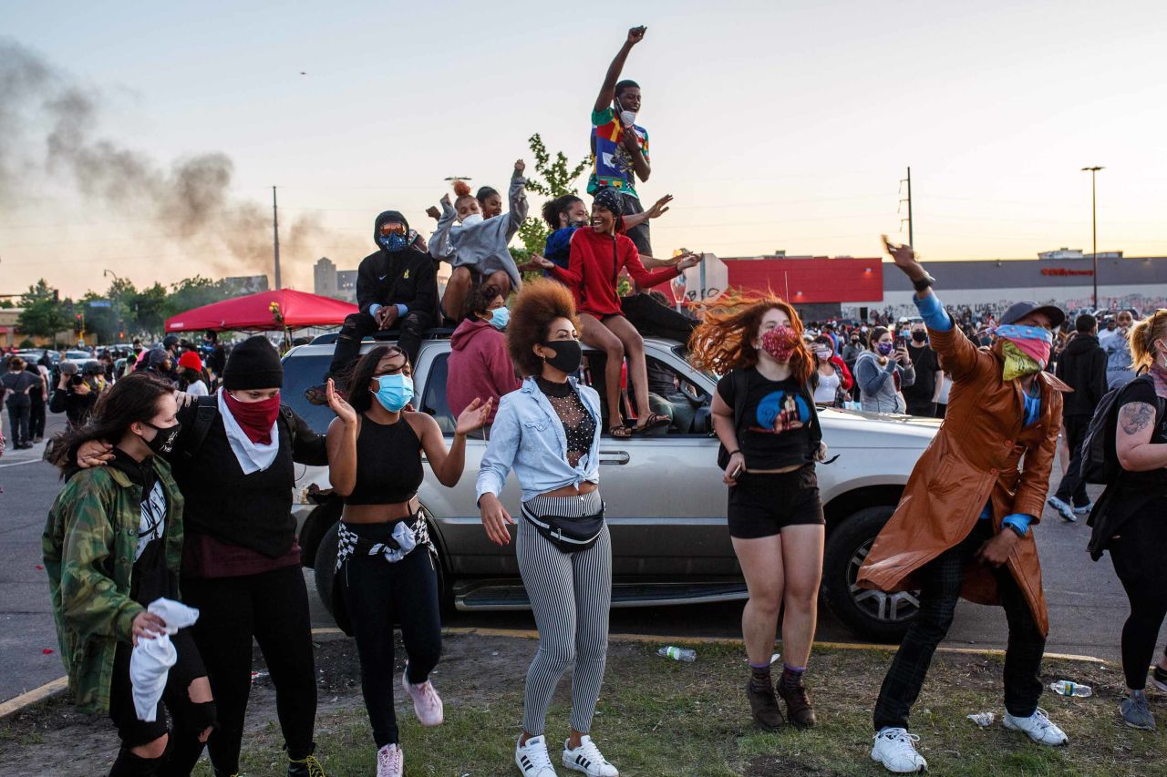 Protesters occupy the parking lot of a Target store near the Minneapolis Third Police Precinct on May 28.