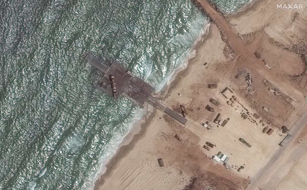 A satellite image shows a view of the remaining section of the trident pier on the Gaza shoreline on May 29, 2024. 