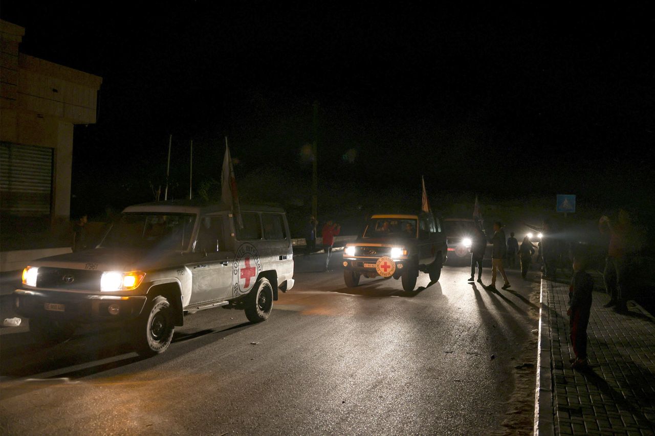 International Red Cross vehicles cross the Rafah border point in Gaza on the way to Egypt on November 24.