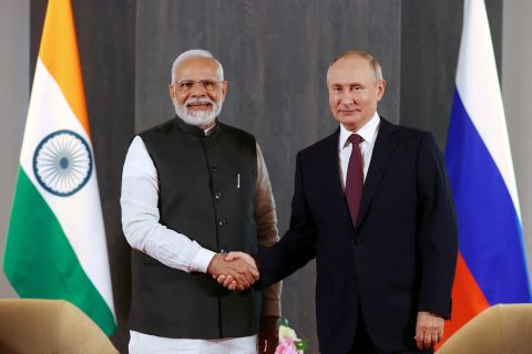 Russian President Vladimir Putin and Indian Prime Minister Narendra Modi shakes hands during a meeting in Samarkand, on September 16.