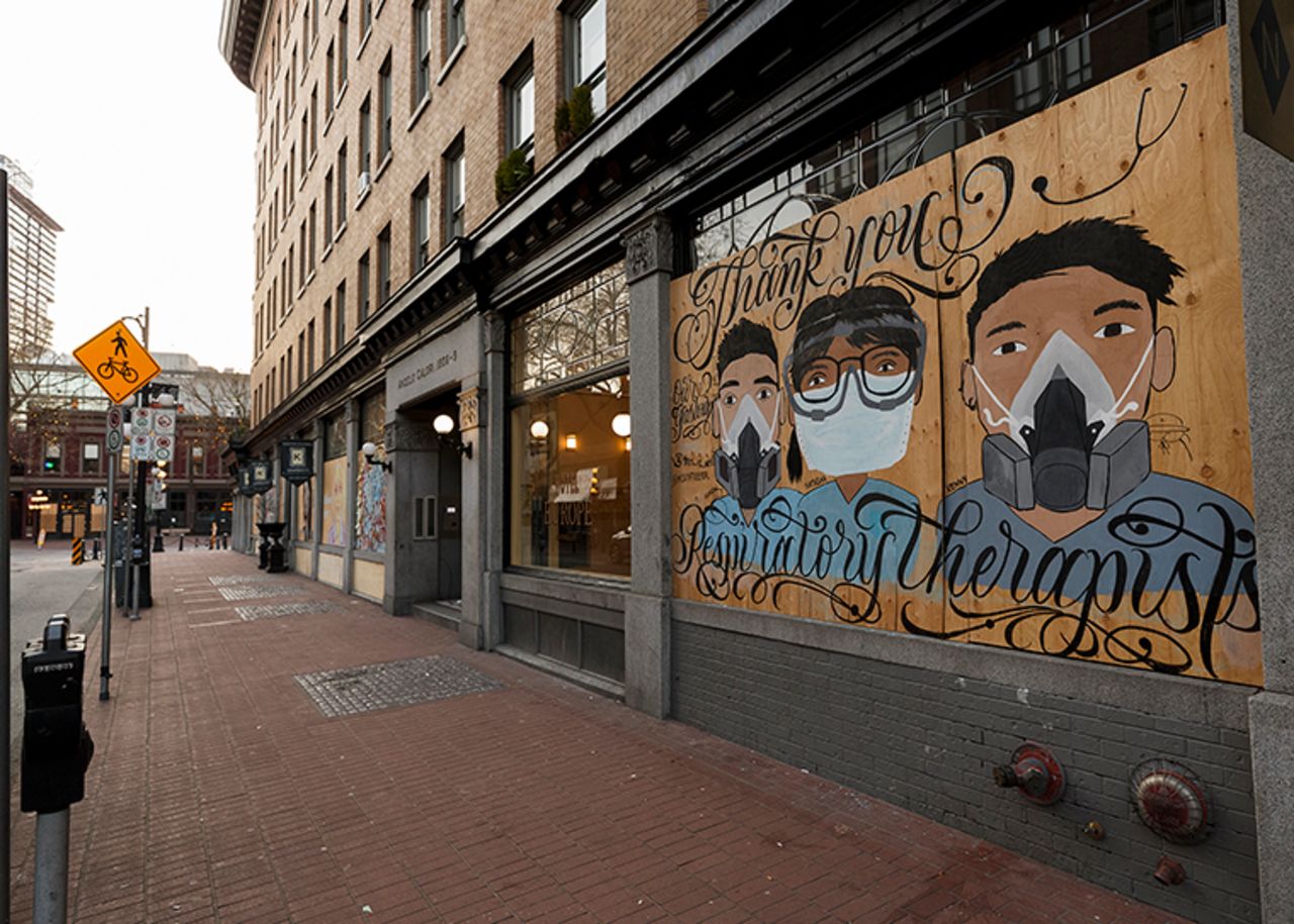 A mural reading "Thank You Respiratory Therapists" is painted on a boarded up window in Gastown on April 09, in Vancouver, Canada. Gastown, normally a popular tourist area in Vancouver is quiet as all non-essential retail has been closed to slow the spread of COVID-19. 