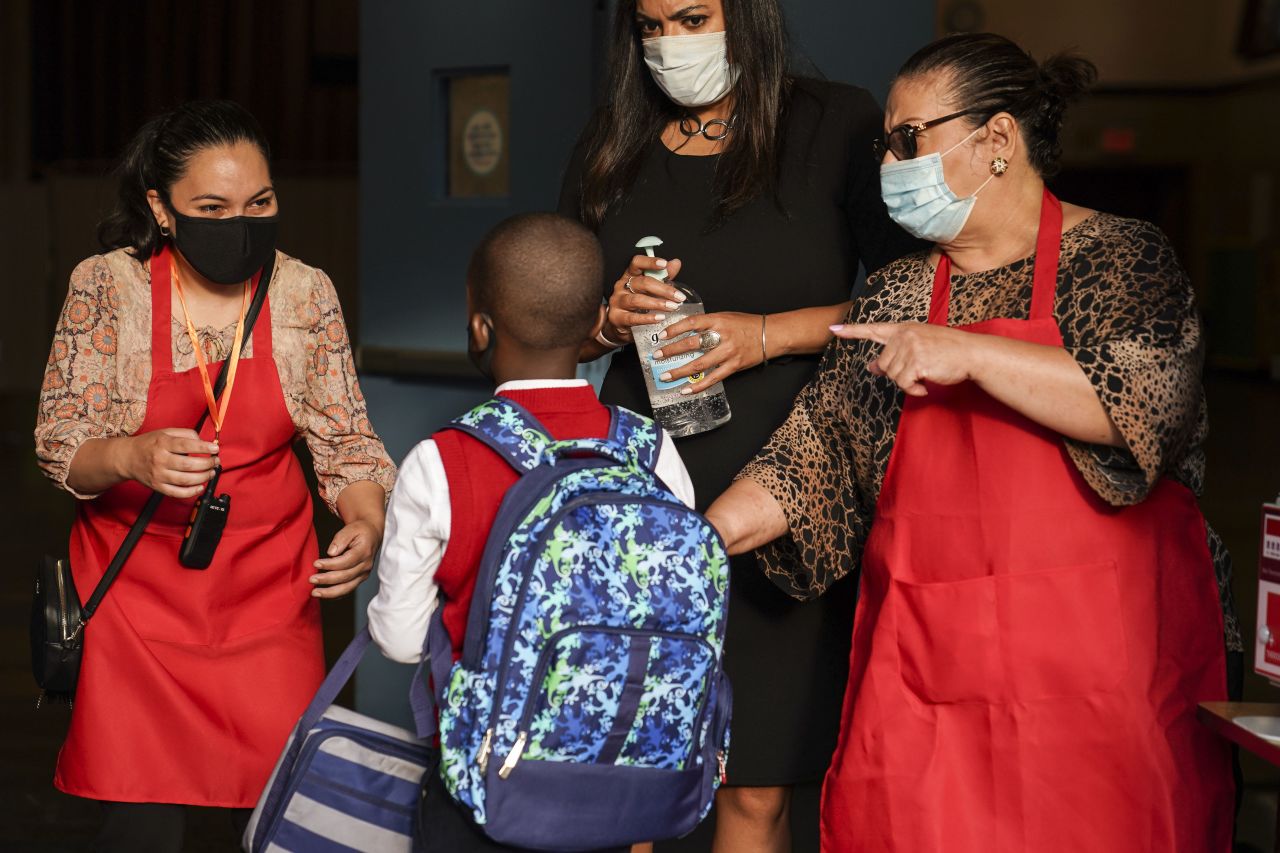 A student arrives for classes at a school in the Bronx, New York, on September 9.