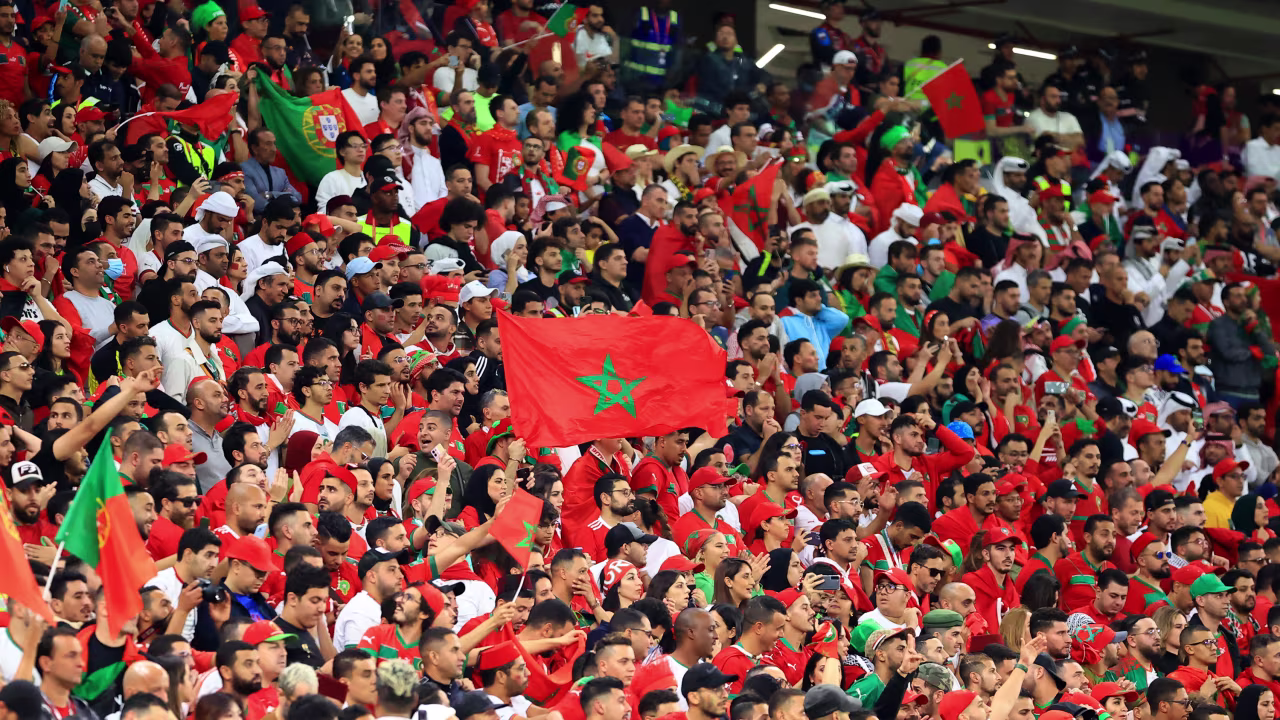 Morocco fans celebrate in the stands. 