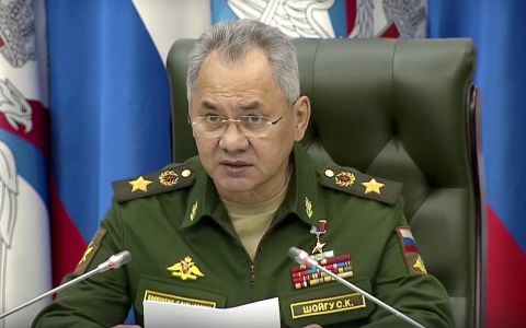 In this handout photo taken from video released by Russian Defense Ministry Press Service, Russian Defense Minister Sergei Shoigu appears on television in Moscow, Russia, on September 21.