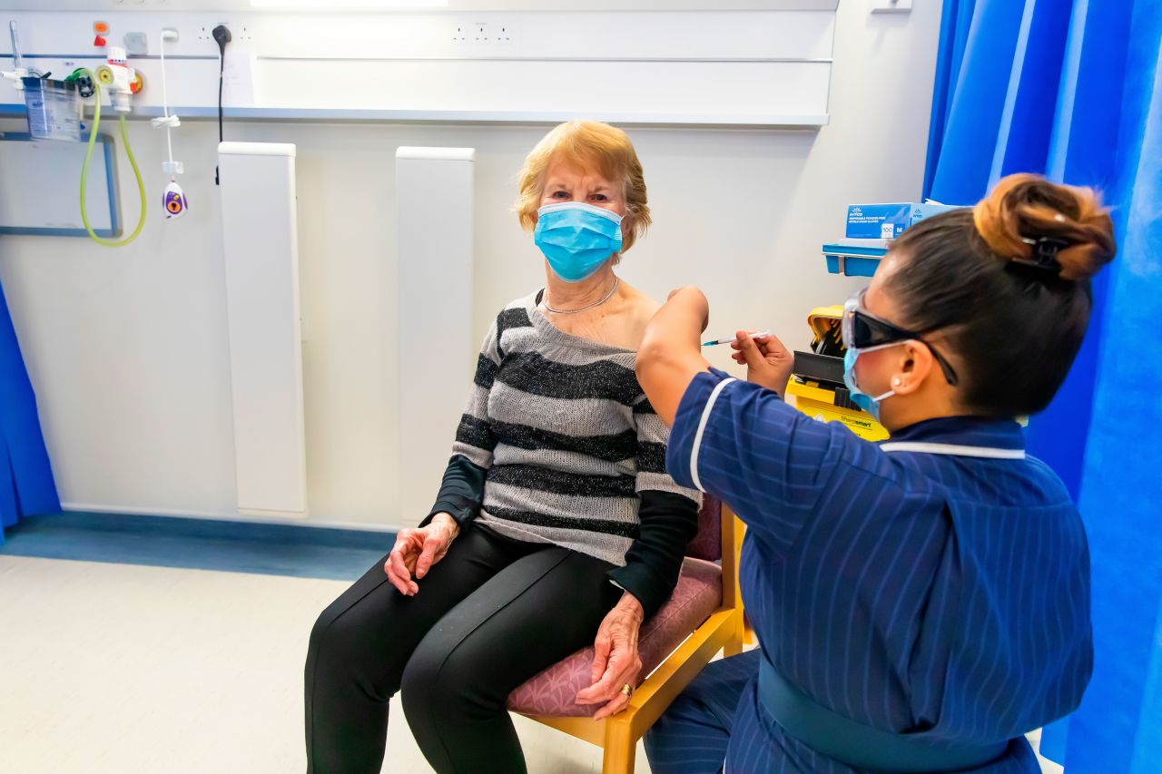 Margaret Keenan receives her second dose of the Pfizer/BioNTech Covid-19 vaccine at University Hospital Coventry in England on December 29.