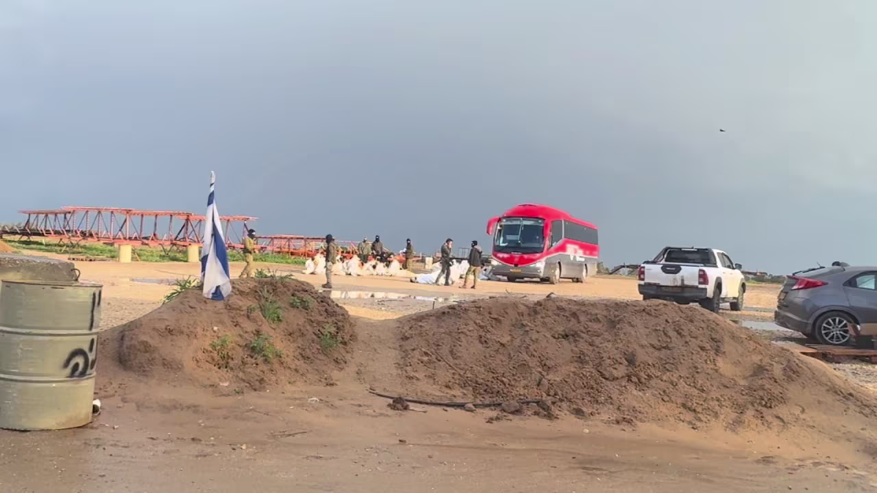 This still image from CNN video shows Palestinian men, who were detained by Israeli forces in Gaza, sitting and kneeling in southern Israel near the Gaza border on January 27.