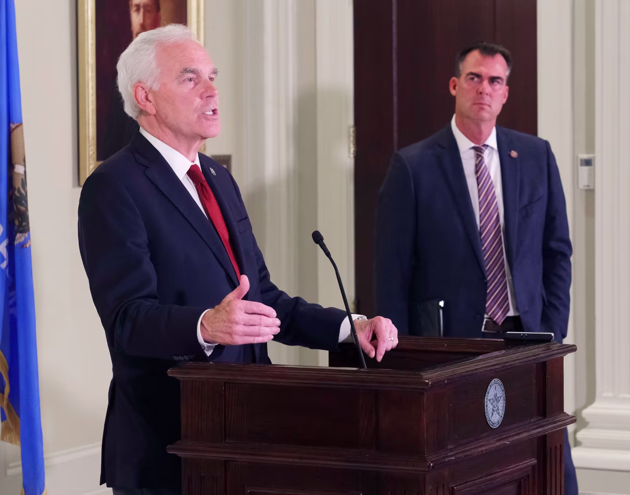 Oklahoma Attorney General John O'Connor, left, speaks as Governor Kevin Stitt looks on during a press conference at the Capitol in Oklahoma City, on Friday.