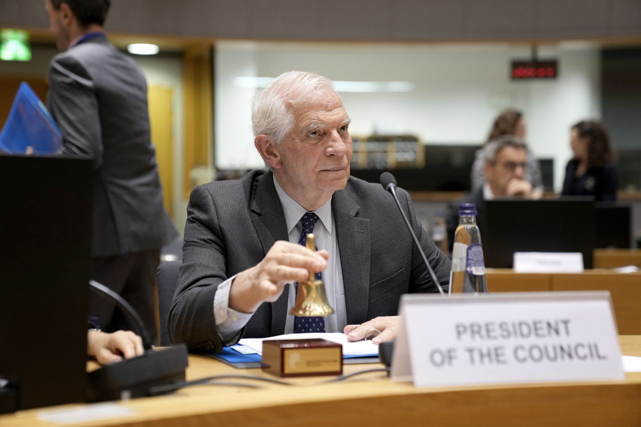 The European Union's foreign policy chief, Josep Borrell, rings a bell to signify the start of a meeting of EU foreign and development ministers at the European Council building in Brussels, Belgium, on May 7, to discuss the humanitarian aspects and reconstruction in Gaza.