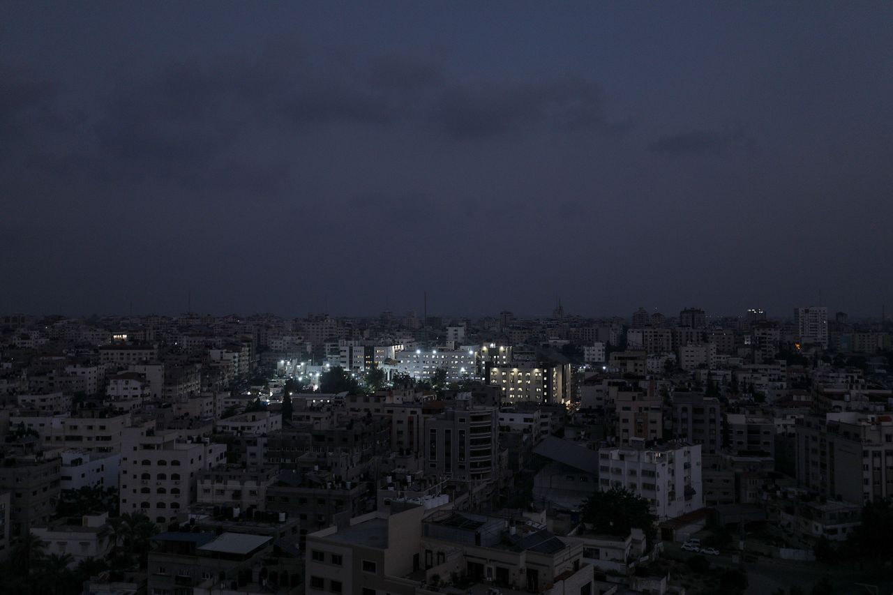 Al Shifa hospital is lit up in Gaza City on October 24. The Health Ministry in Gaza warned that electric generators in hospitals will cease functioning within days due to a fuel shortage.