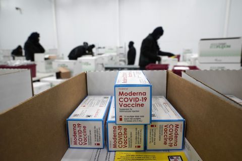 Boxes containing the Moderna Covid-19 vaccine are prepared to be shipped at the McKesson distribution center in Olive Branch, Mississippi, on December 20.