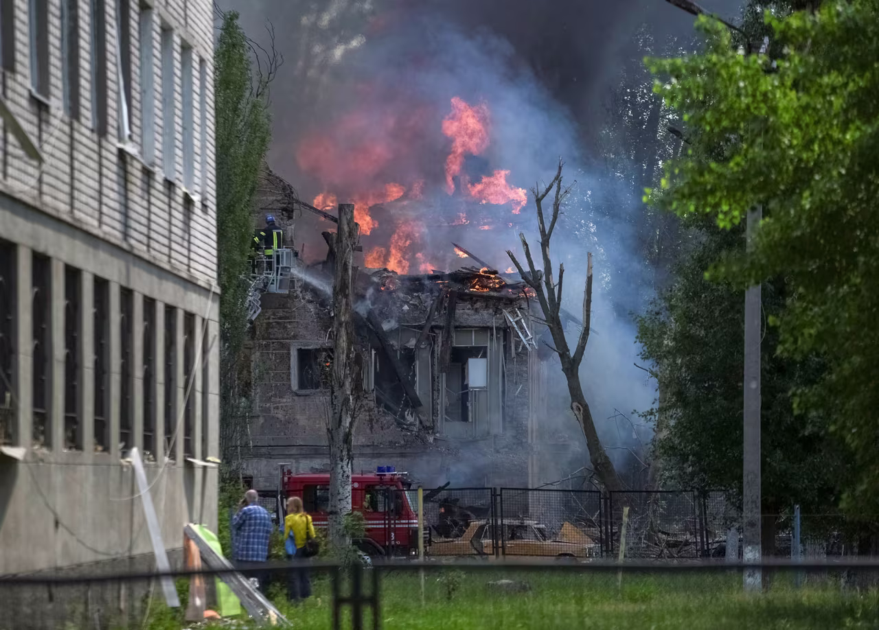 Emergency services attend to a clinic damaged by a Russian missile strike in Dnipro, Ukraine, on May 26.