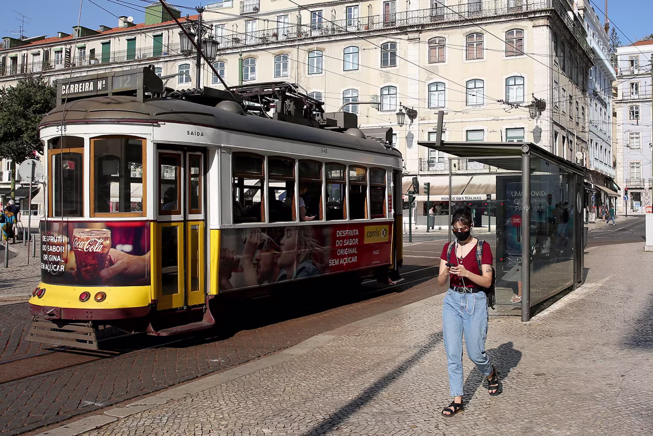 A woman walks in downtown Lisbon, Portugal, on Tuesday, September 15.