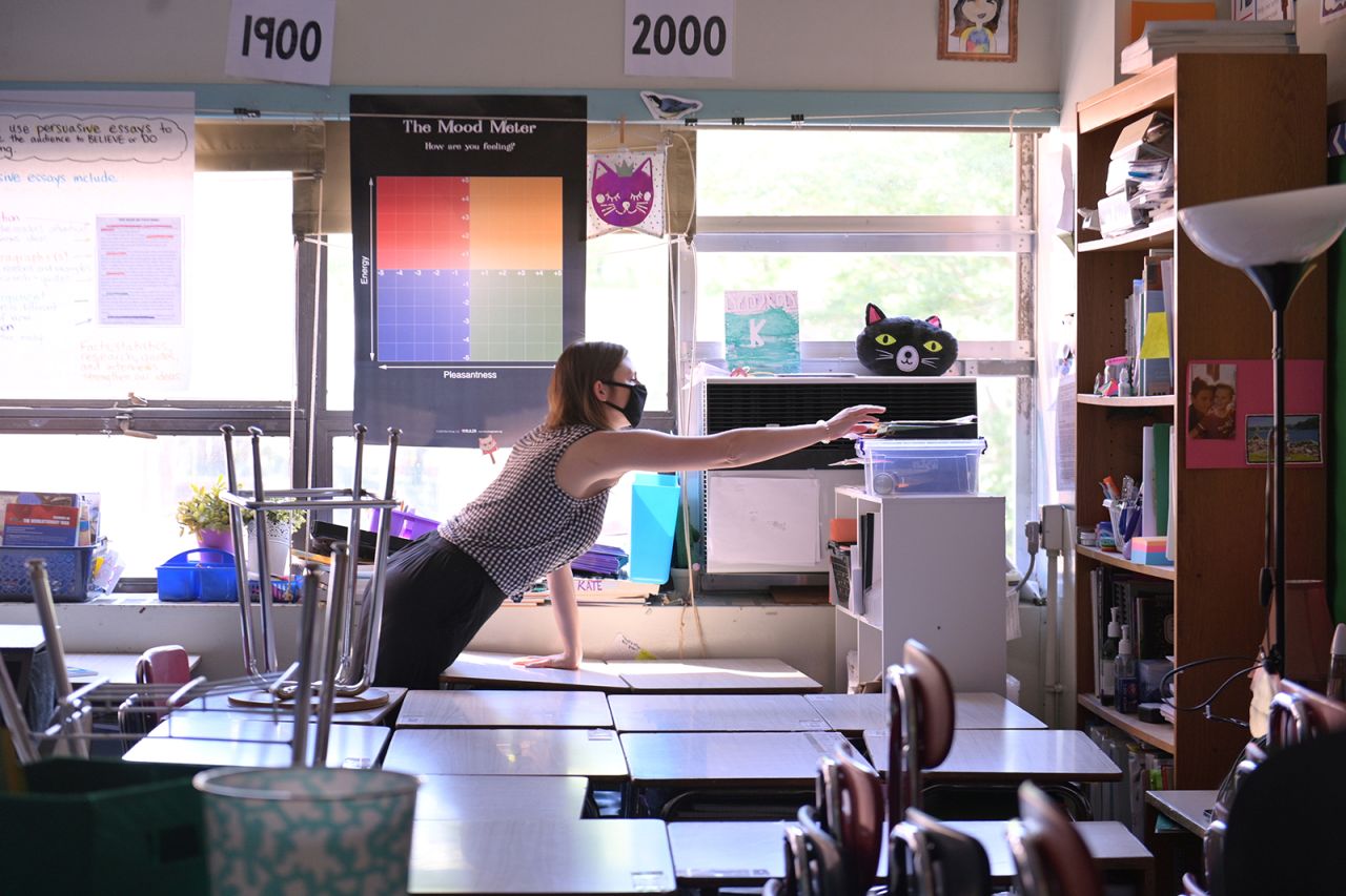 A teacher collects personal belongings and supplies needed to continue remote teaching through the end of the school year at Yung Wing School P.S.124 in New York, on June 09.