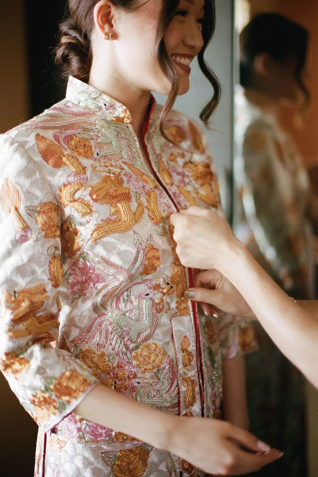 A hand embroidered qun kwa by Jinza Oriental Couture.