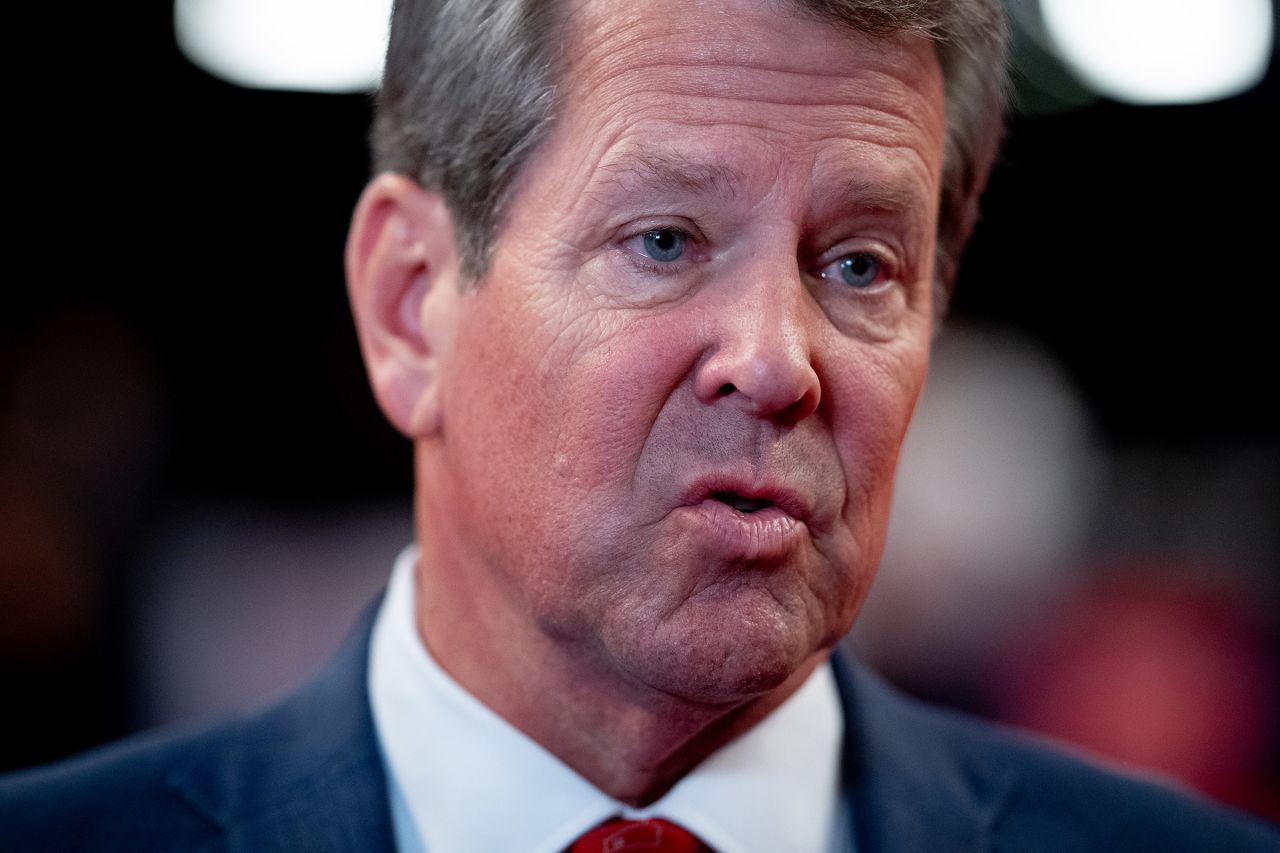 Georgia Gov. Brian Kemp speaks to a reporter in the CNN Spin Room ahead of a CNN Presidential Debate between Donald Trump and Joe Biden on June 27.