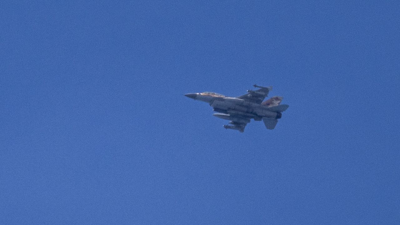 An Israeli fighter jet is seen over the Mediterranean sea on September 23.