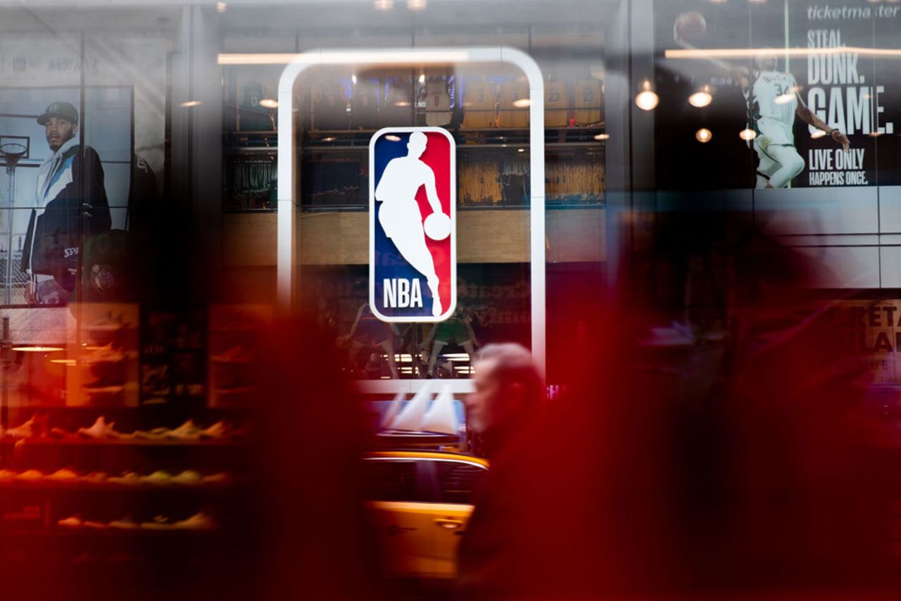 An NBA logo is shown at the 5th Avenue NBA store on March 12, in New York City.