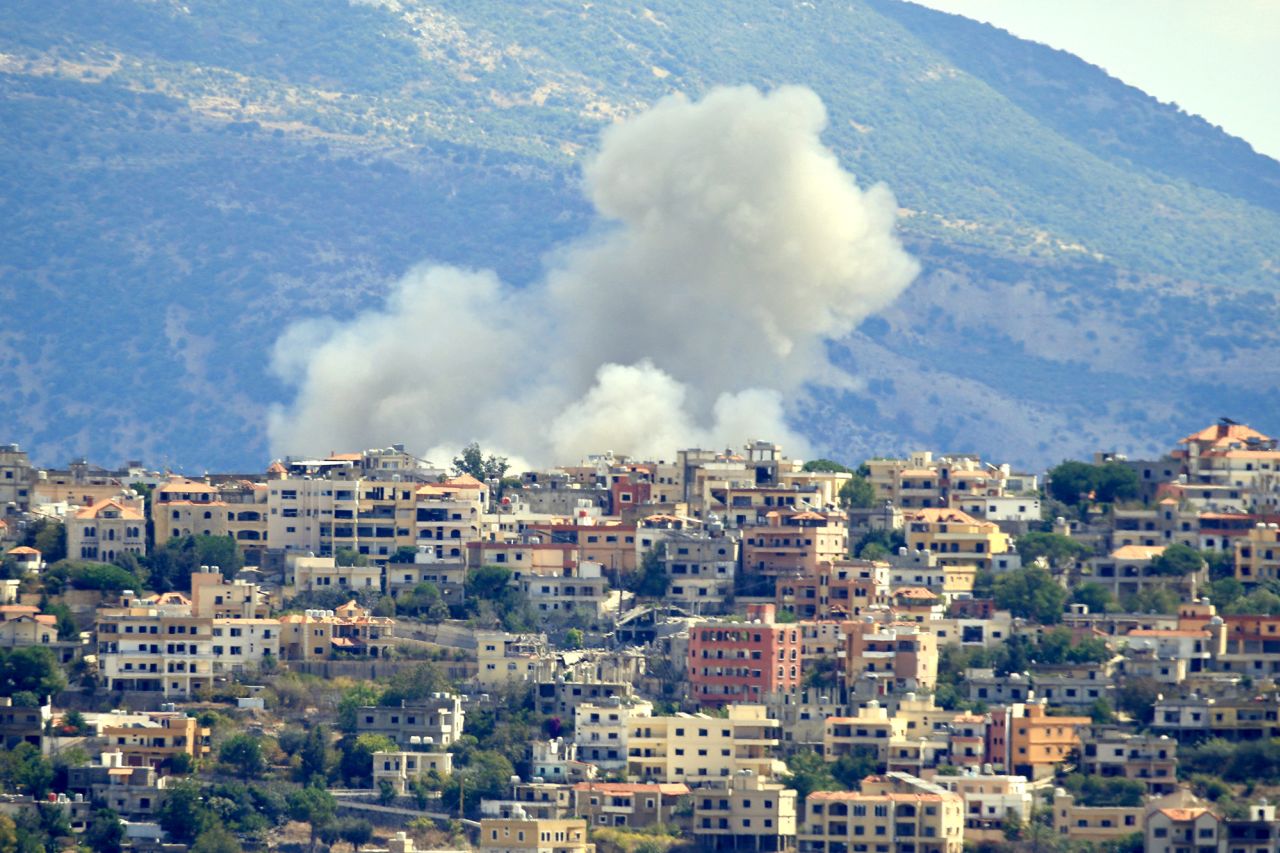 Smoke billows from the site of an Israeli airstrike in the southern Lebanese village of Khiam near the border with Israel, on September 19.