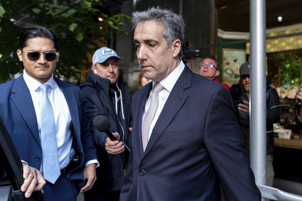 Michael Cohen leaves his apartment building on his way to Manhattan criminal court on Monday, May 13, in New York.