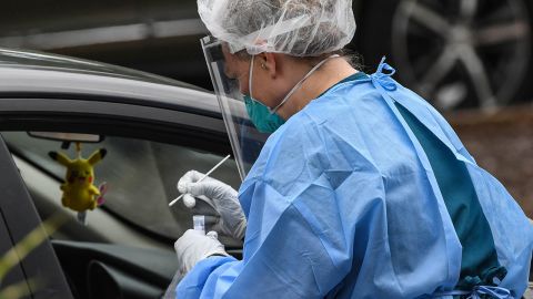 AnMed phlebotomists test people in their cars during a free COVID-19 testing at the Civic Center in Anderson South Carolina on June 18.