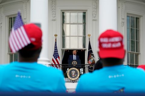 President Donald Trump speaks to supporters at the White House on October 10.