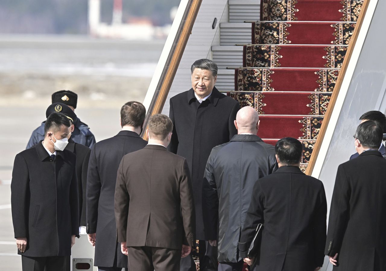 Chinese President Xi Jinping disembarks from a plane upon his arrival at Vnukovo International Airport in Moscow, Russia, on March 20. 