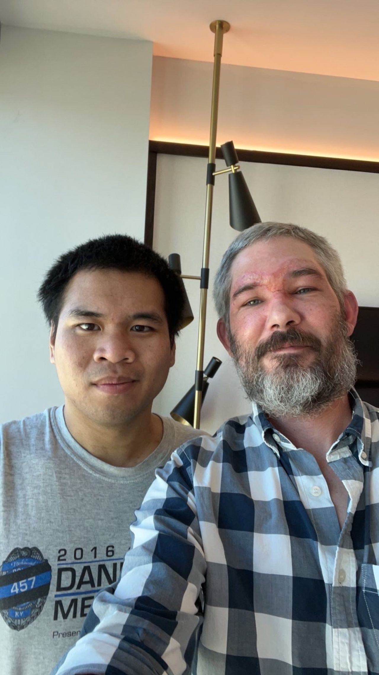 Americans Alexander John-Robert Drueke, right, and Andy Tai Ngoc Huynh, left, after arriving back in the US after being freed from Russian captivity.