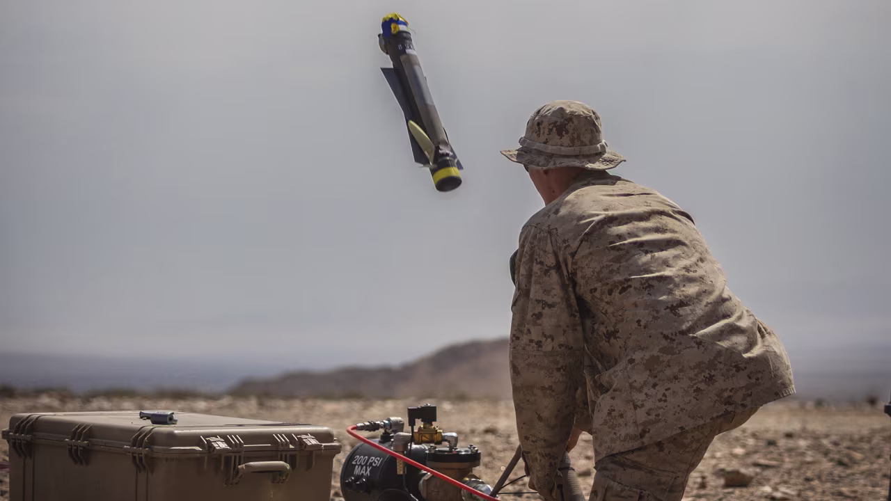 A U.S. Marine launches a Switchblade 300 10C system during a training exercise at the Marine Corps Air Ground Combat Center Twentynine Palms, California on Sept. 24, 2021.