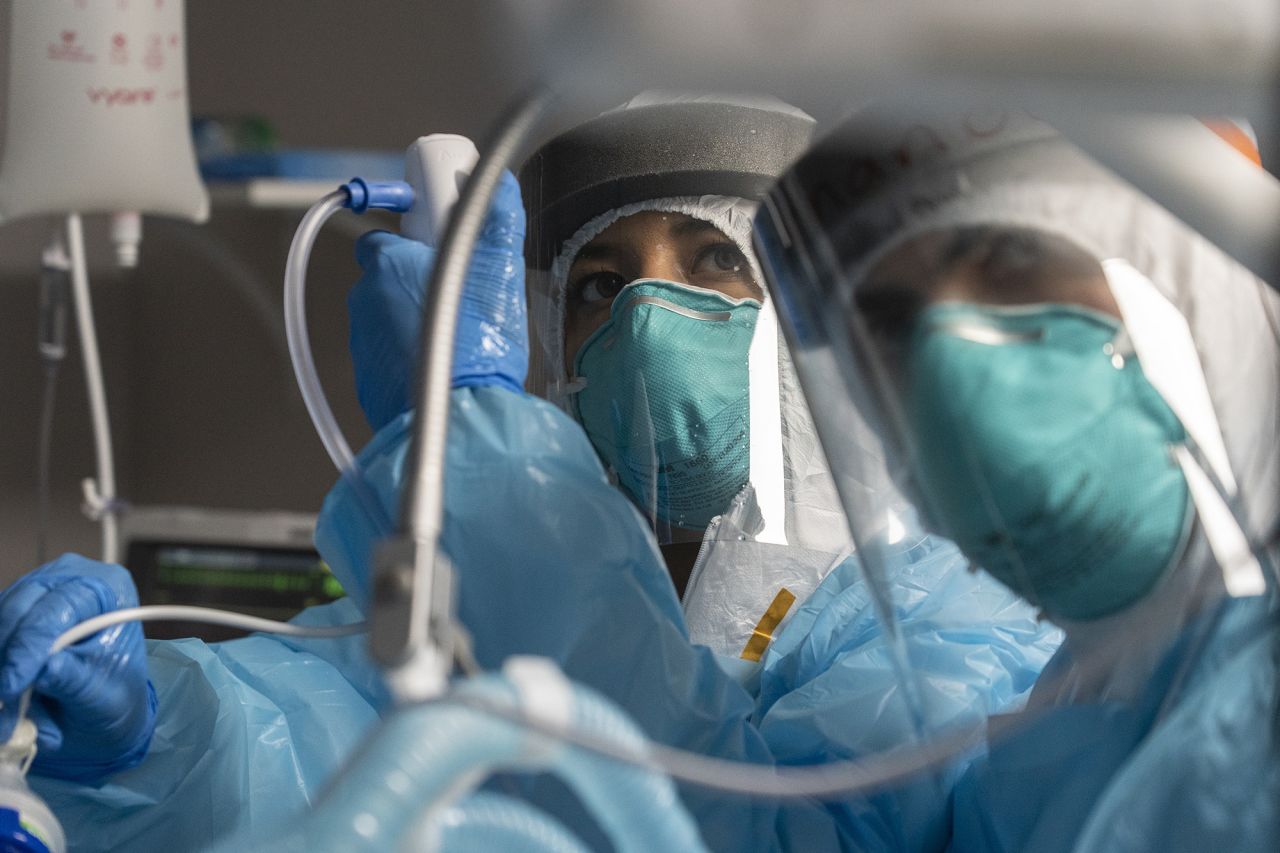 Medical staff members work in the COVID-19 intensive care unit (ICU) at the United Memorial Medical Center on November 26, in Houston, Texas. 