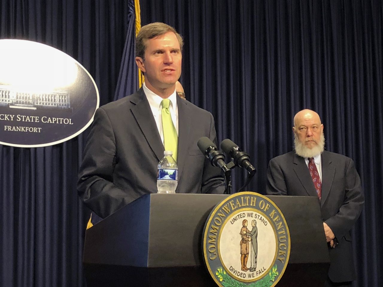 Kentucky Gov. Andy Beshear discusses developments in Kentucky regarding COVID-19 on Friday, March 13, in Frankfort, Kentucky.
