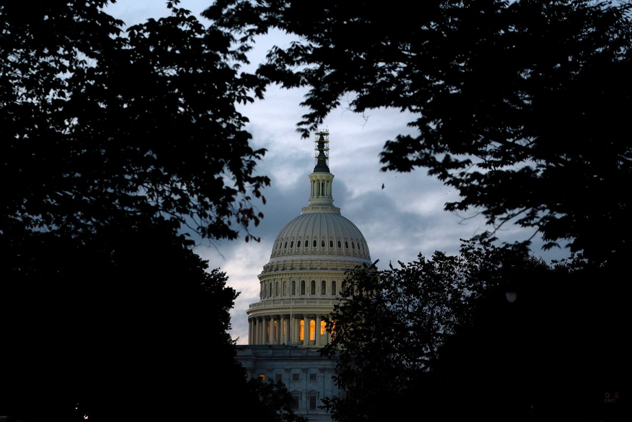 The US Capitol is seen at sunrise on September 30, in Washington, DC.