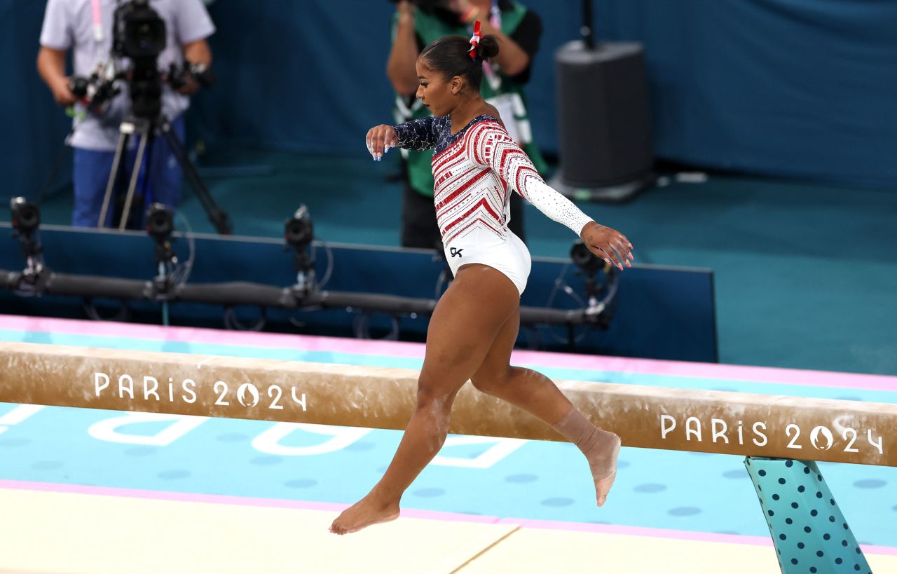 Jordan Chiles falls while competing on the balance beam on Tuesday.