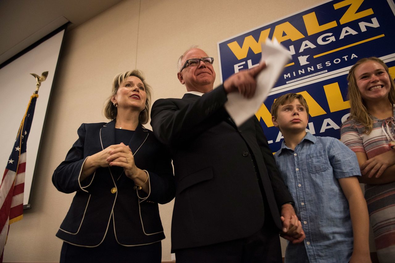 Gwen Walz, left, stands next to her husband Tim Walz and their children Gus and Hope, during an election night party in St. Paul, Minnesota, in 2018.