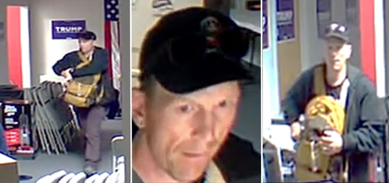 Investigators released images from surveillance video showing the burglary suspect inside the campaign office wearing dark clothing, a dark cap and a backpack.