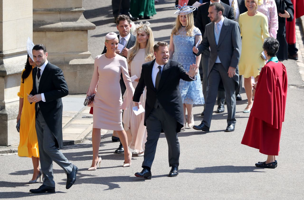 James Corden and Julia Carey arrive for the wedding ceremony.