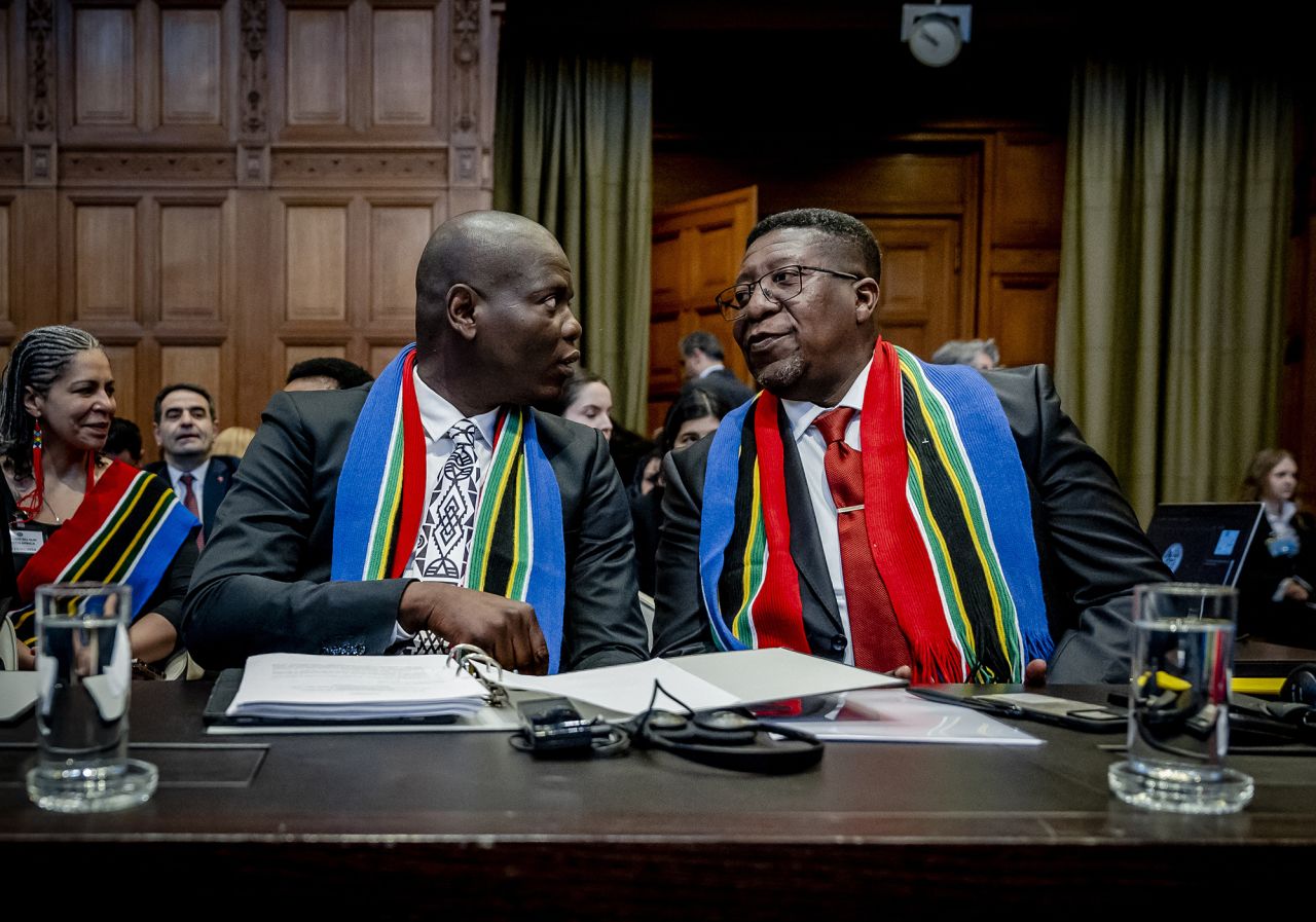 South Africa Minister of Justice Ronald Lamola, left, and South African Ambassador to the Netherlands Vusimuzi Madonsela attend the International Court of Justice (ICJ) ahead of the hearing of the genocide case against Israel brought by South Africa, in The Hague, Netherlands, on January 11.