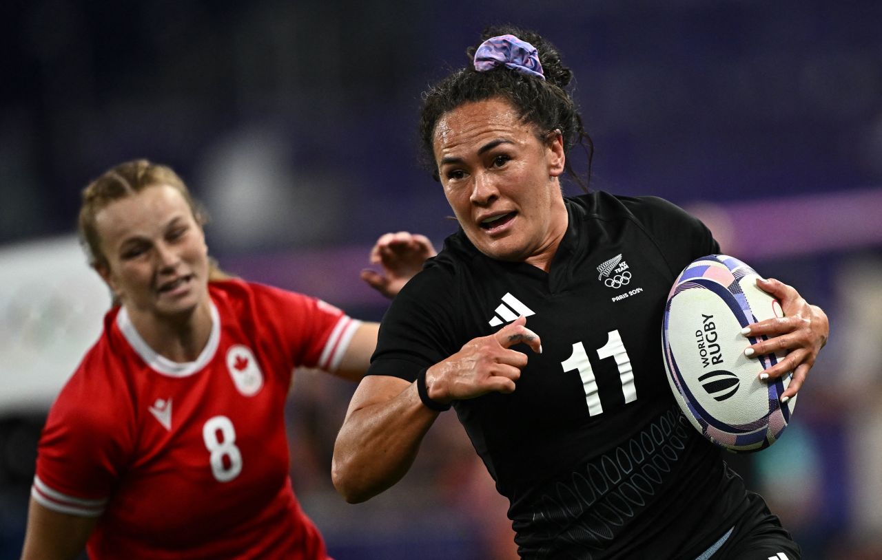 Portia Woodman-Wickliffe of New Zealand runs with the ball in a match against Canada on Sunday.