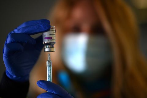 A health worker prepares a dose of the AstraZeneca/Oxford vaccine at the Wanda Metropolitano stadium in Madrid, Spain, on March 24.