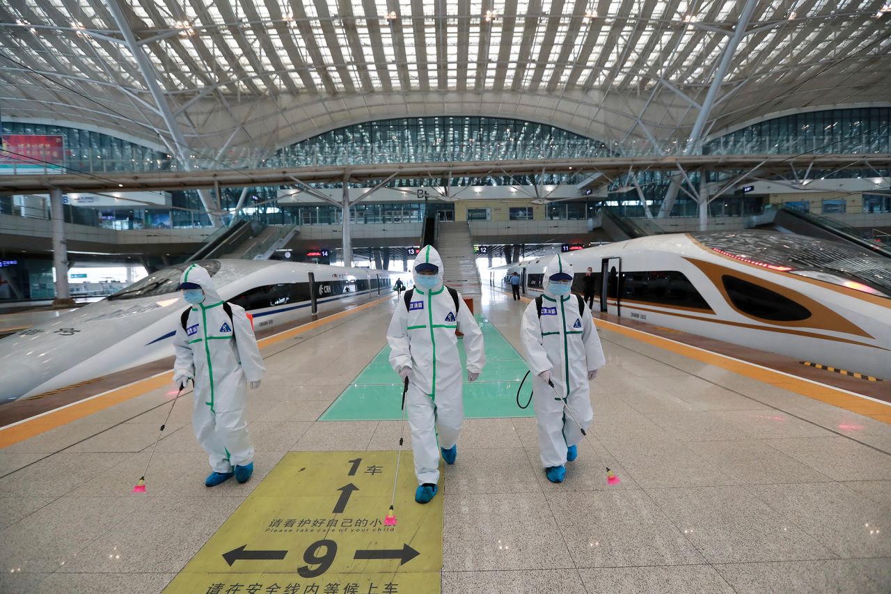 In this photo released by Xinhua News Agency, firefighters conduct disinfection on the platform of Wuhan Railway Station in Wuhan, central China's Hubei Province, on March 24. 