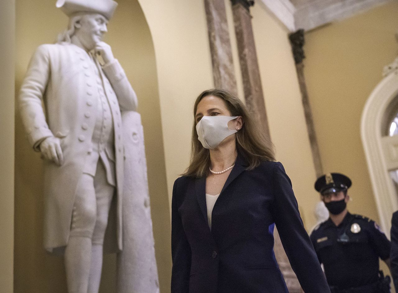 Judge Amy Coney Barrett, President Donald Trump's nominee for the Supreme Court, arrives for closed meetings with senators, at the Capitol in Washington on Wednesday, October 21. 