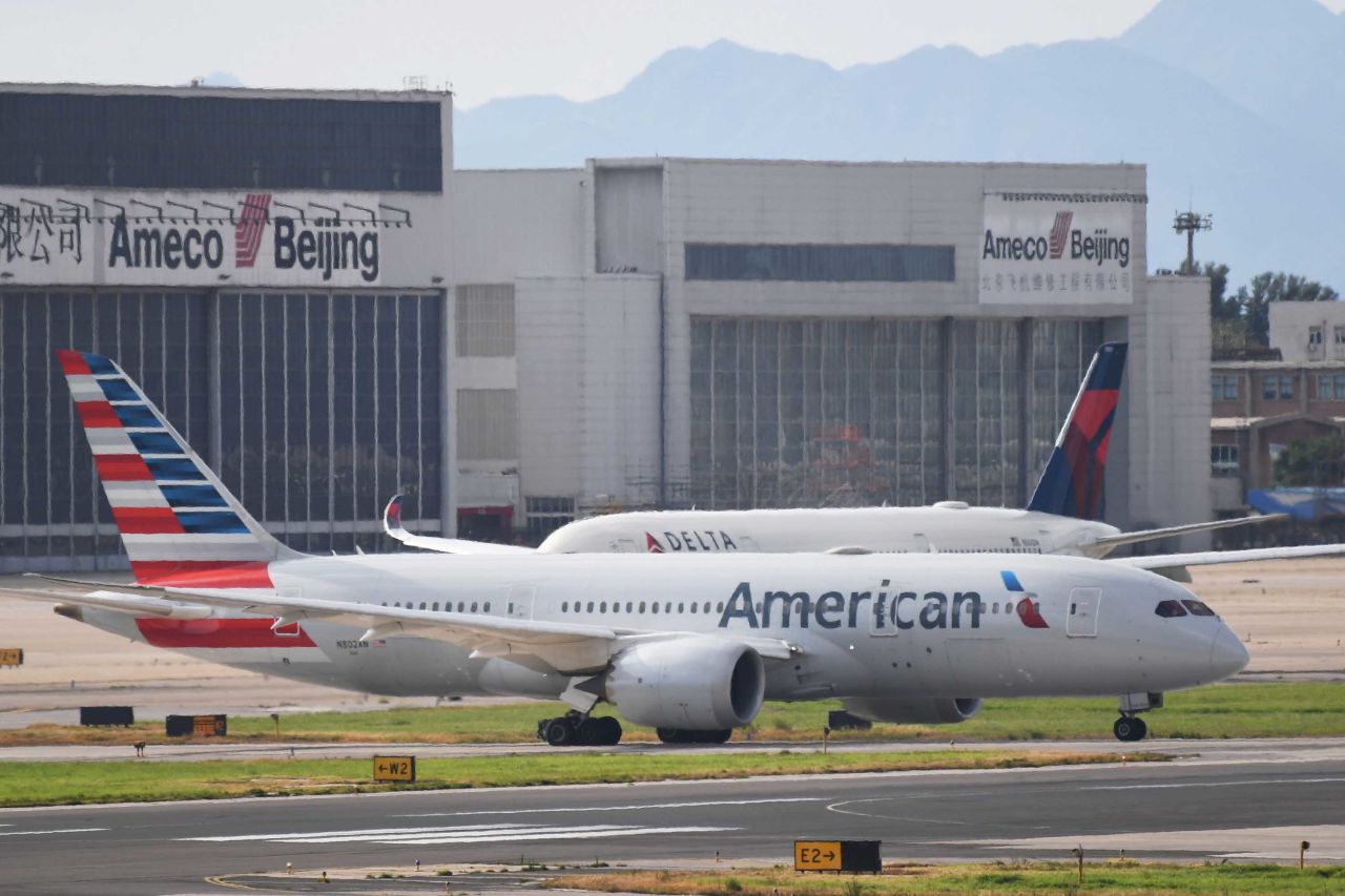 An American Airlines aircraft waits to take off at Beijing airport in July 2018.