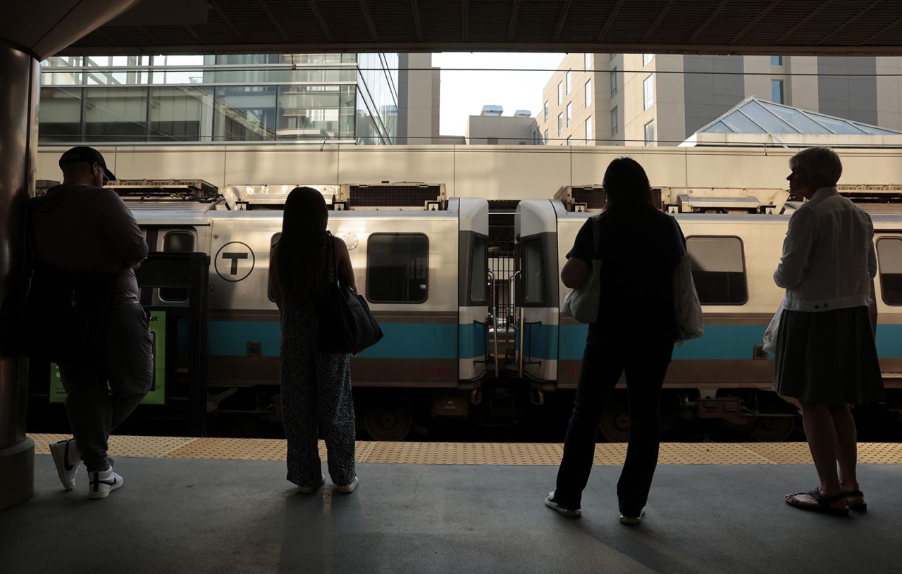 Commuters wait for a train in Boston, MA, on July 5.