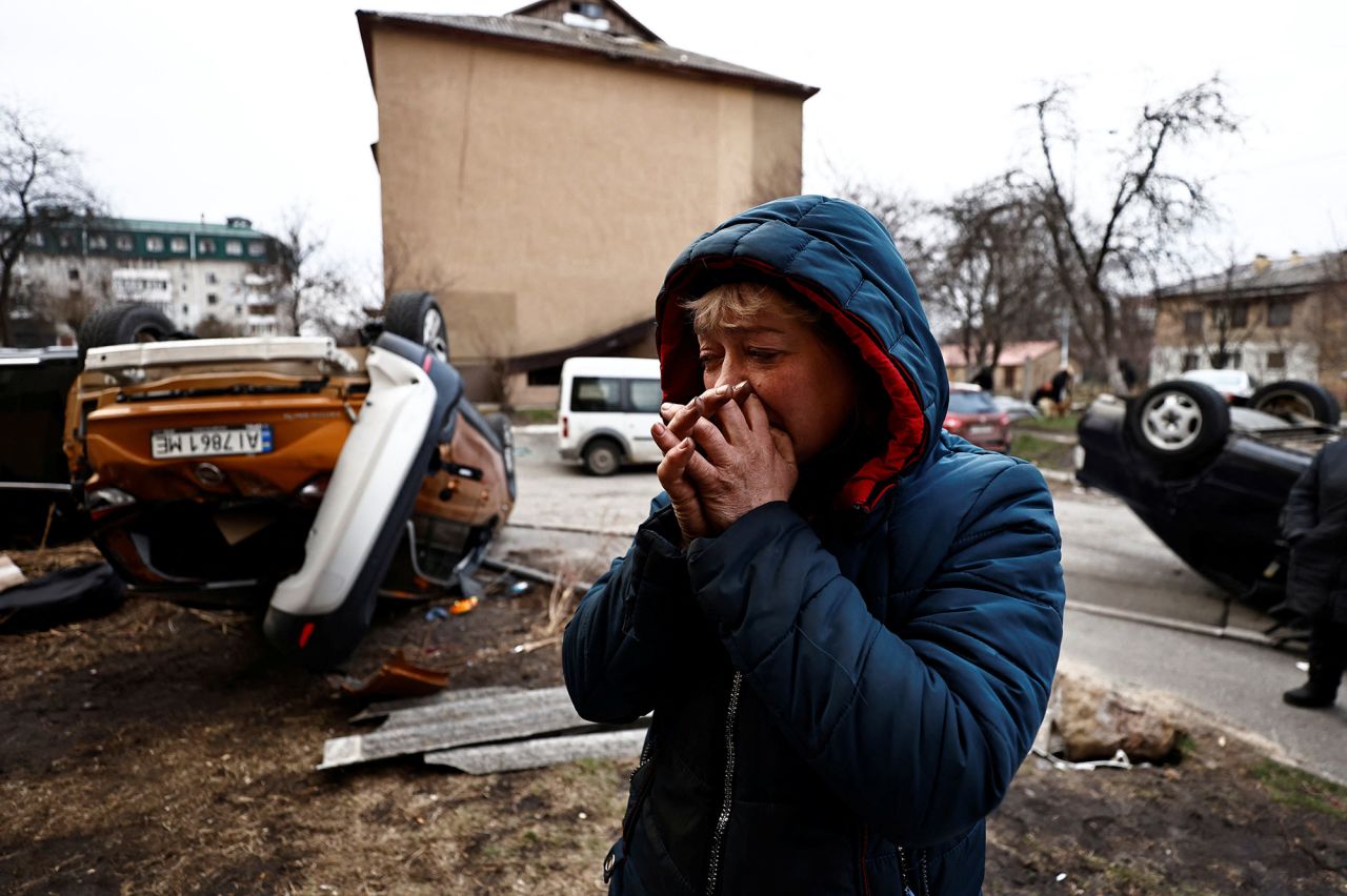 Ludmyla Verginska, 51, attends a burial of her friend Igor Lytvynenko in Bucha, Ukraine, on April 5.