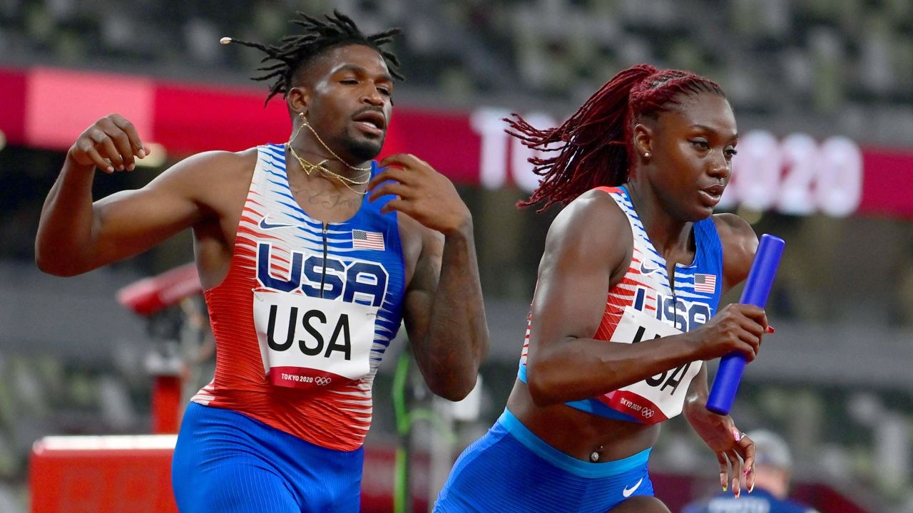 USA's Elija Godwin, left, and Lynna Irby compete in the mixed 4x400m relay on July 30.