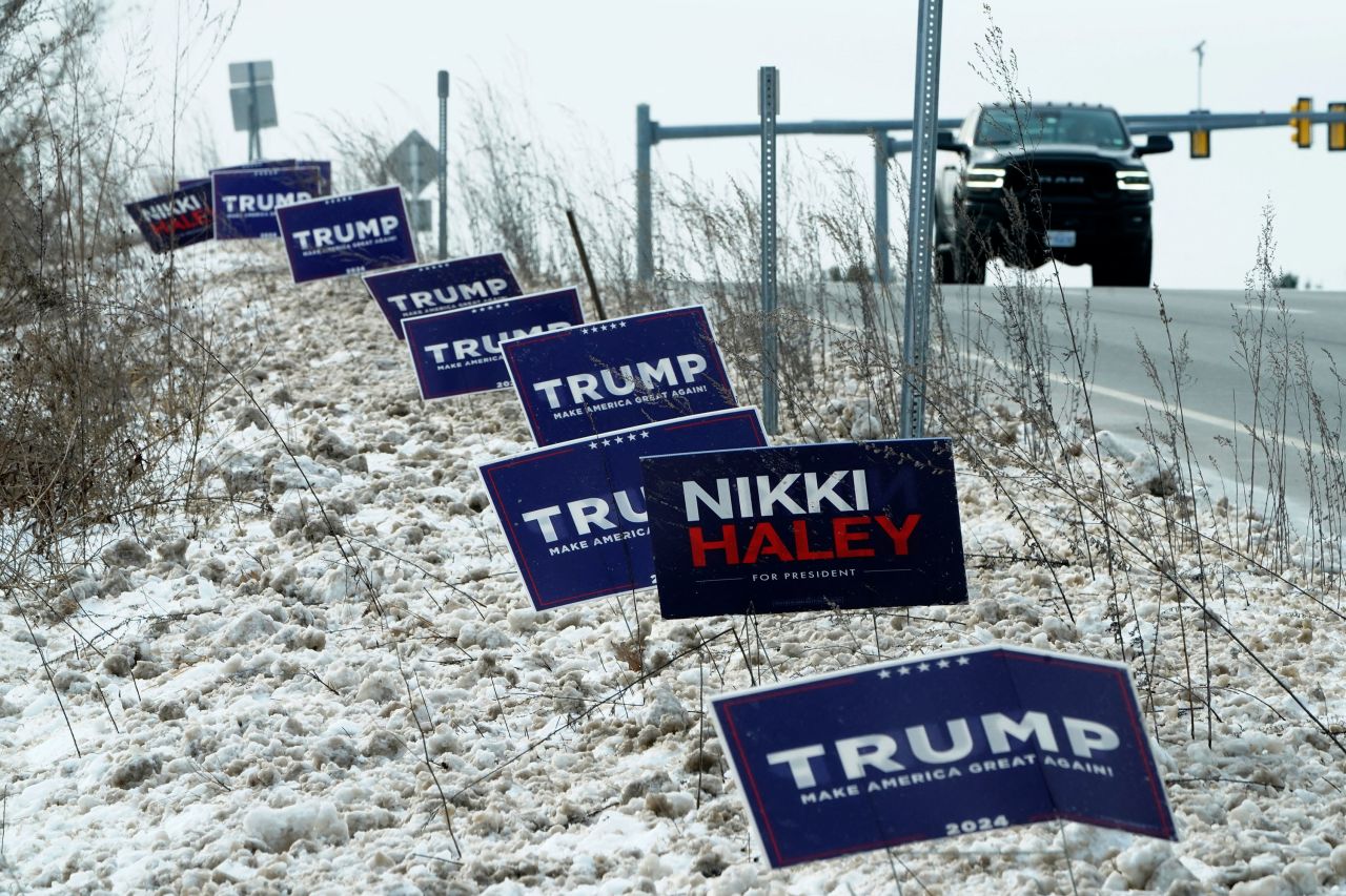 Campaign signs are seen along a highway in Concord, New Hampshire, on January 18.