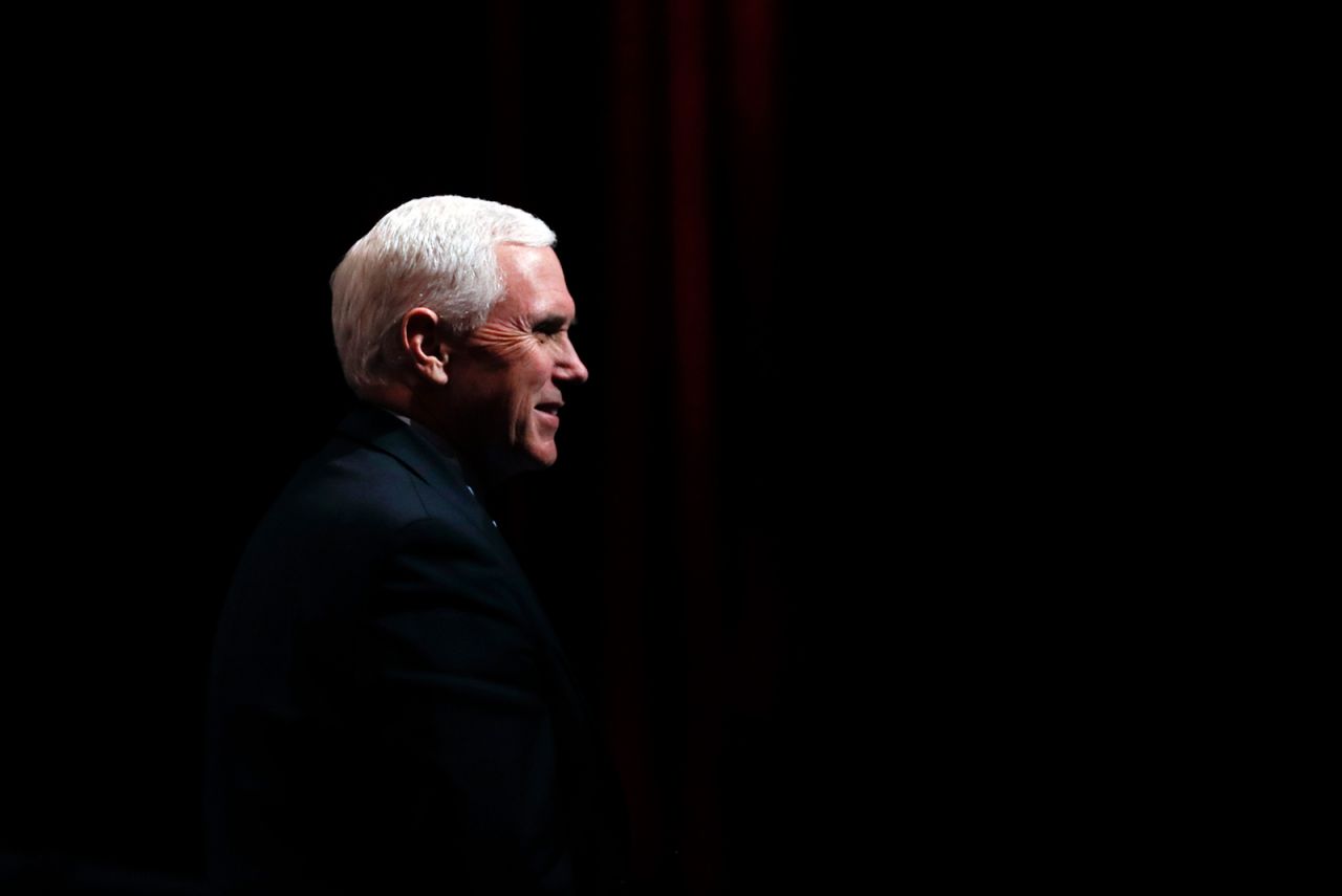 Vice President Mike Pence reacts to audience members after a roundtable on May 8, in West Des Moines, Iowa.