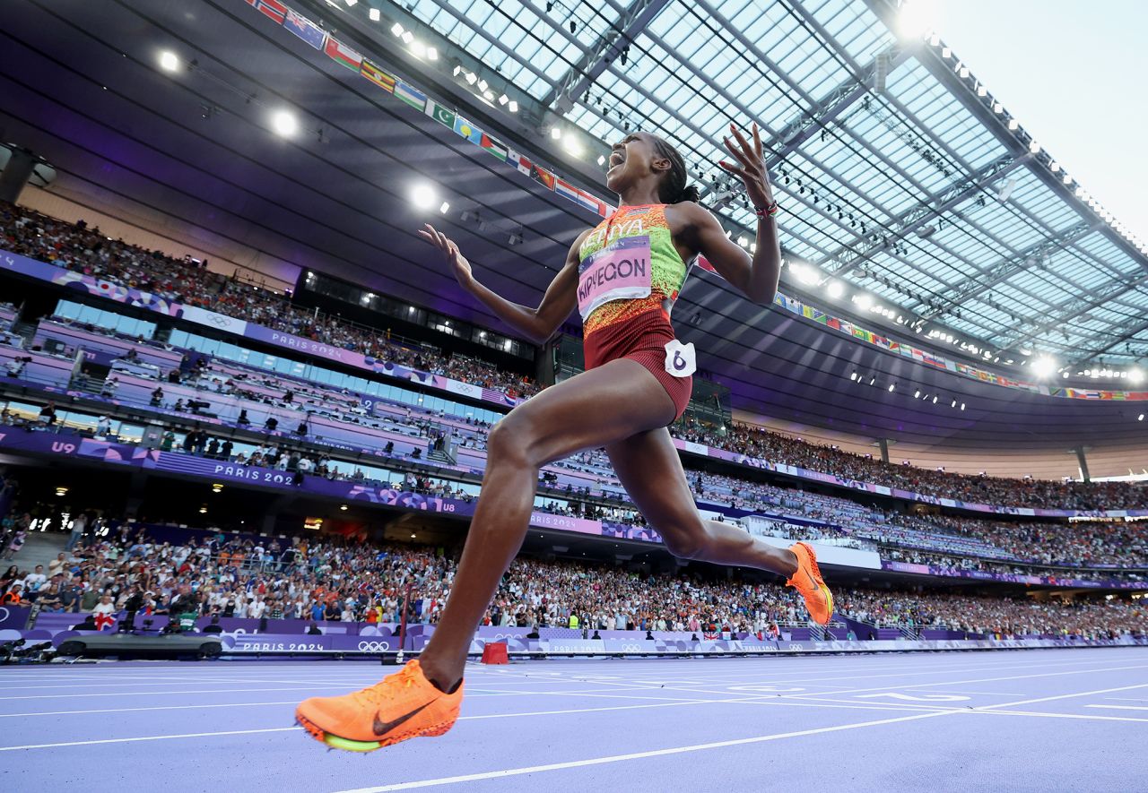 Kenya’s Faith Kipyegon celebrates winning the women's 1500-meter final on August 10.