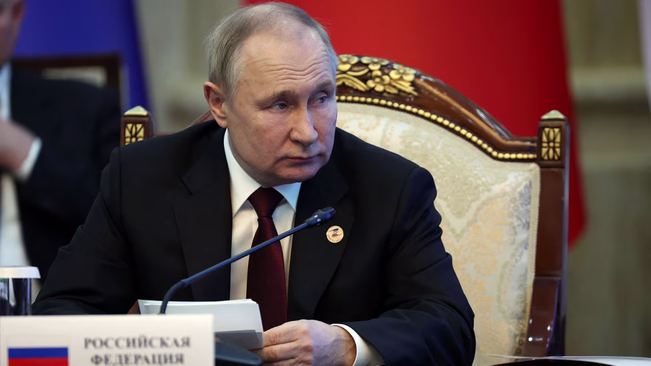 Russia's President Vladimir Putin attends the Supreme Eurasian Economic Council meeting at the Congress Hall in Bishkek on December 9.